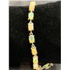 Image 2 : Tennis Bracelet Ladies natural Fire opals 10.30 Carats with certificate value of $1700.00