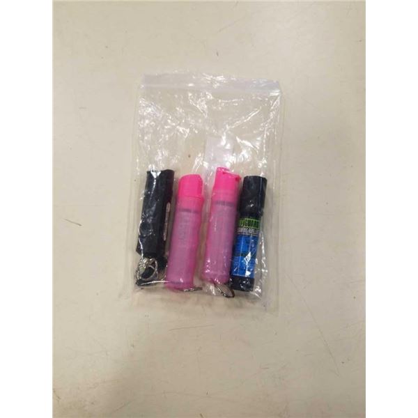 4 NEW CANNISTERS OF PEPPER SPRAY