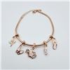 Image 1 : STERLING SILVER ROSE TONE PLATED ENAMEL CHARM BRACELET, W/A $415.00