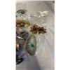 Image 2 : 4 BAGS OF JEWELLRY - PINS, BROOCHES, PENDANTS, AND MORE
