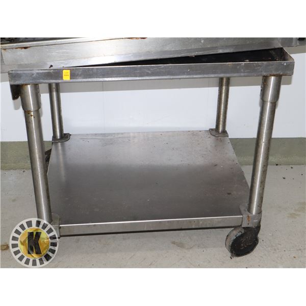 STAINLESS STEEL EQUIPMENT TABLE ON CASTORS