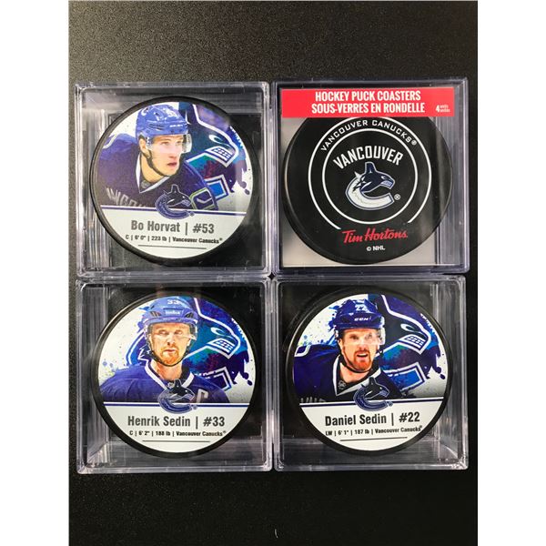 VANCOUVER CANUCKS COLLECTIBLE HOCKEY PUCKS LOT (HORVAT, SEDINS)