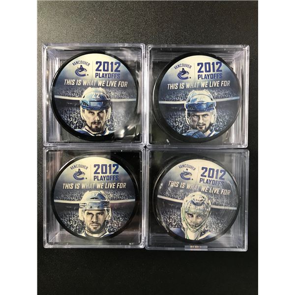 VANCOUVER CANUCKS COLLECTIBLE HOCKEY PUCKS LOT