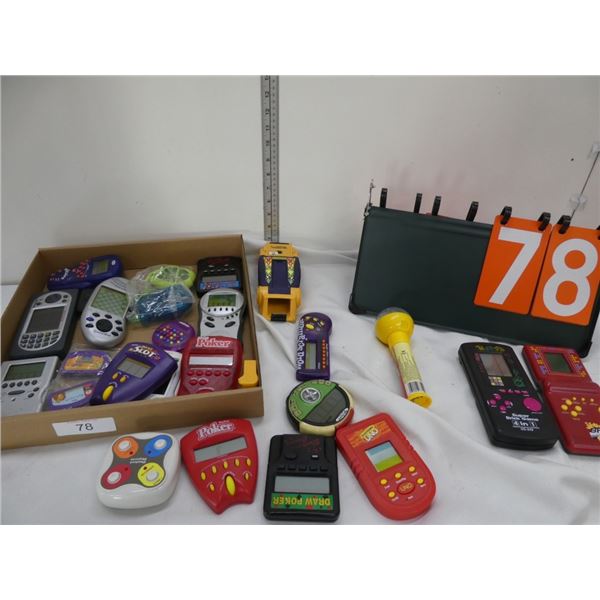 assorted handheld electronic games