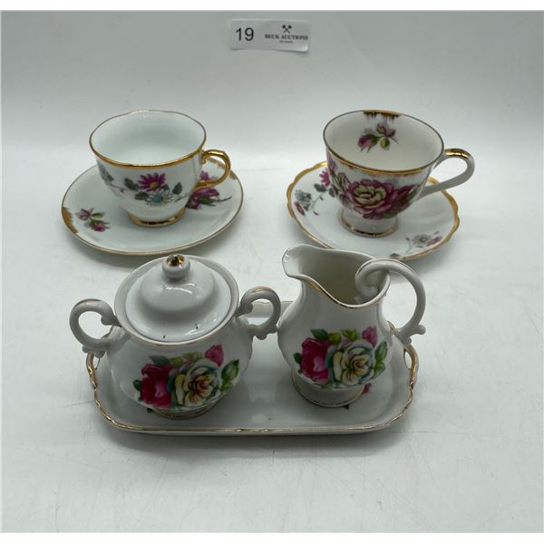 Tea cups with creamer and sugar