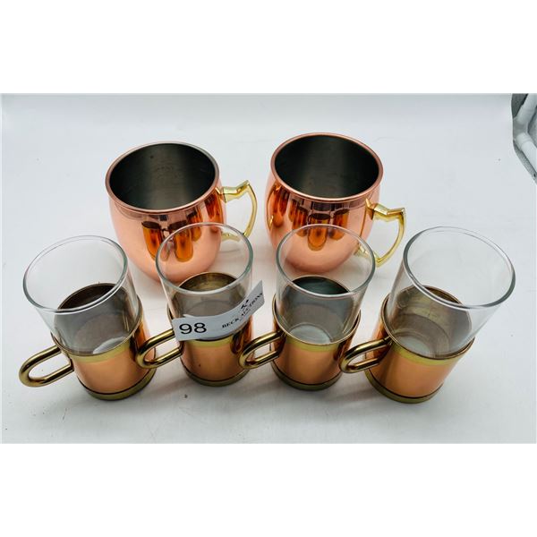Copper and glass coffee cups