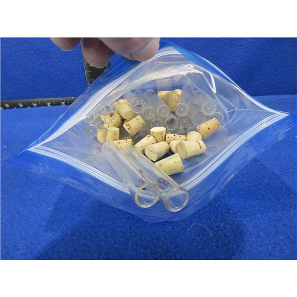 23 Plastic Tubes with 30 Corks