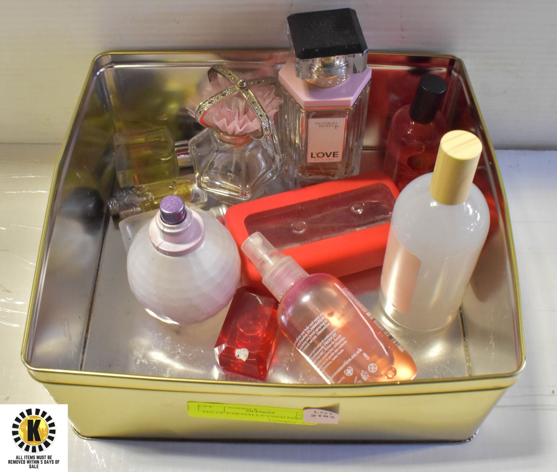 TIN OF PARTIALLY USED PERFUMES