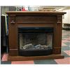 Image 1 : ELECTRIC FIREPLACE W/ CARVED SURROUND AND MANTLE