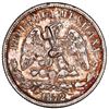 Image 1 : Cuba, 50 centavos, long-and-thin key incuse countermark (1872-77) on a Guanajuato, Mexico, 50 centav