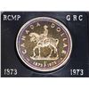 Image 2 : 1973 RCMP Centennial Silver Dollar. Specimen. Beautifully Toned. Housed in its original black clamsh