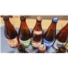 Image 4 : 12 Tall 650ml beer bottles - assorted brands
