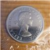 Image 1 : 1964 RCM Silver Dollar Uncirculated and in Sealed Package