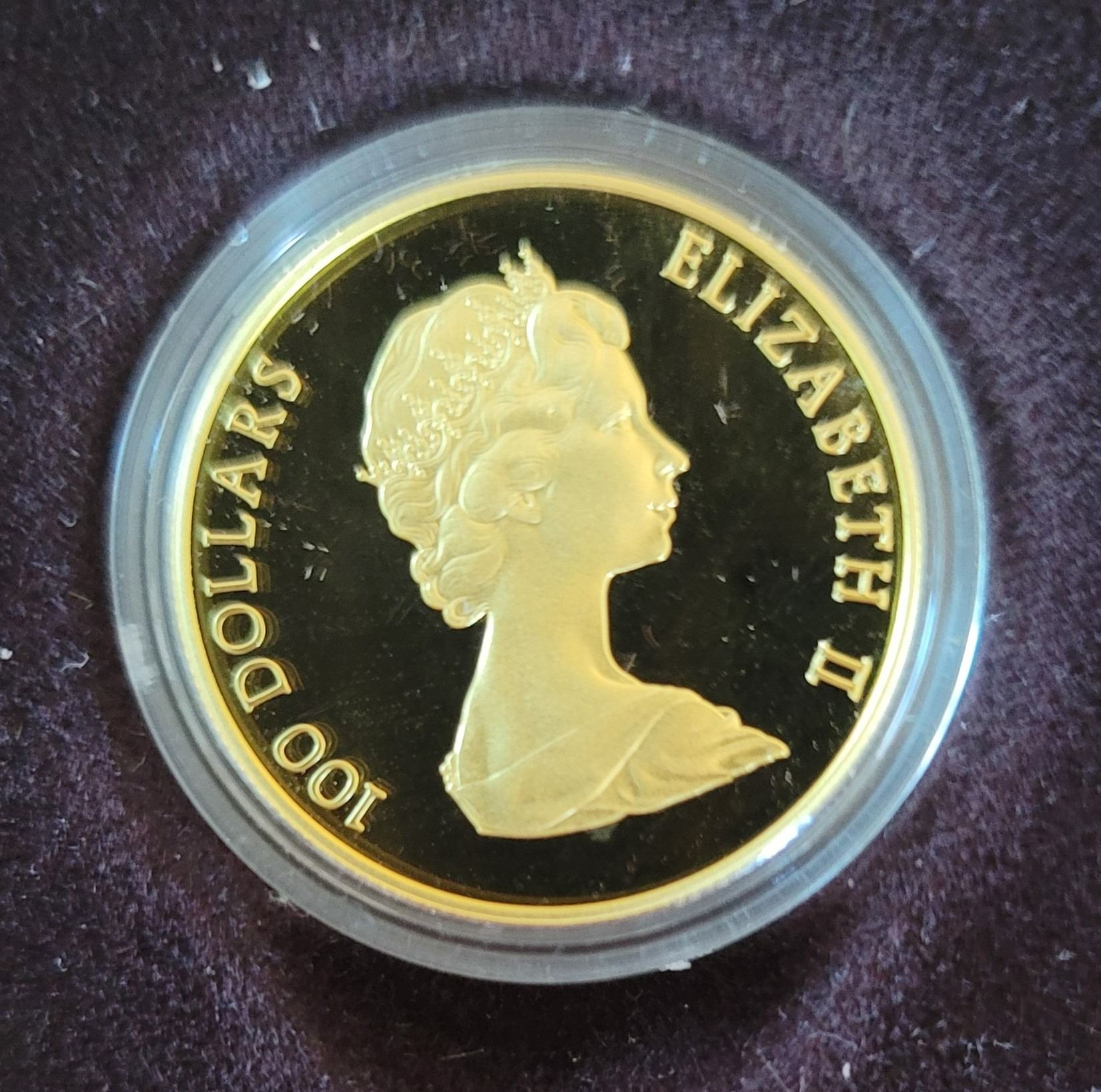 1982 RCM Canadian 100 Dollar Gold Coin 1982-rcm-canadian-100-dollar-gold-coin