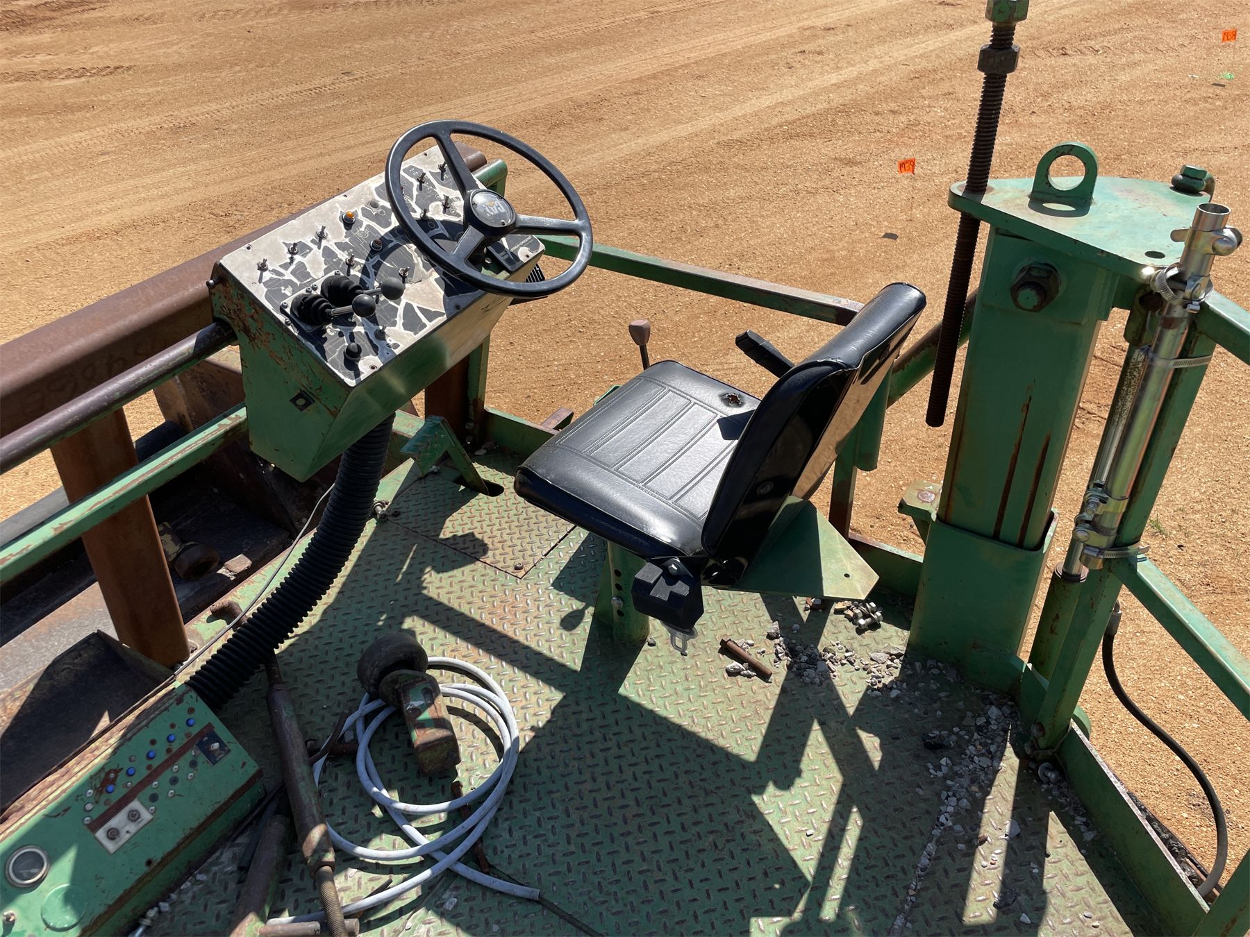 1997 BARBER GREENE BG750 Road Widener - J.M. Wood Auction Company, Inc.