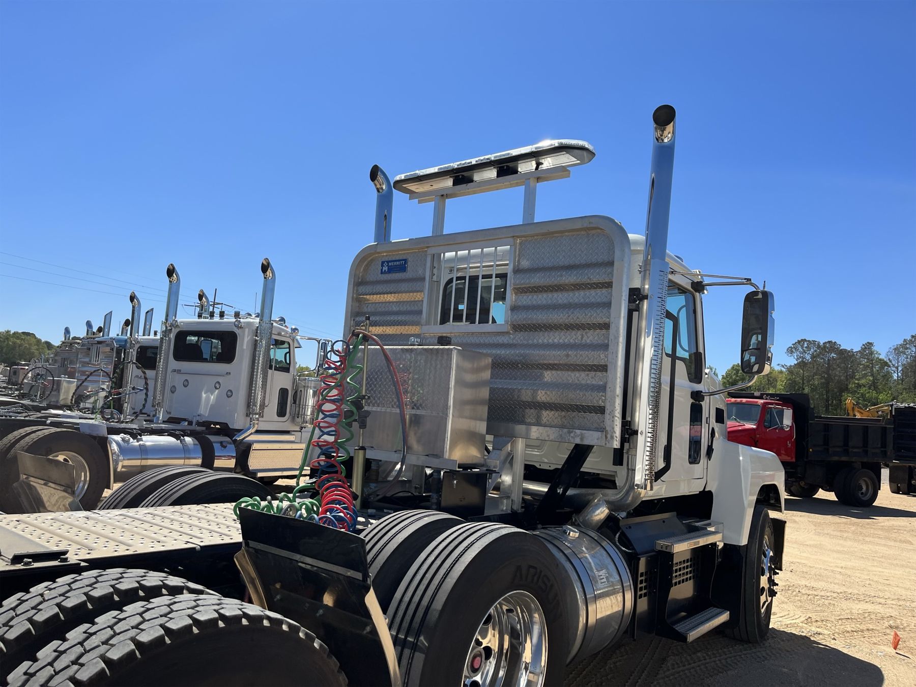 2023 MACK PI64T Day Cab Truck - J.M. Wood Auction Company, Inc.