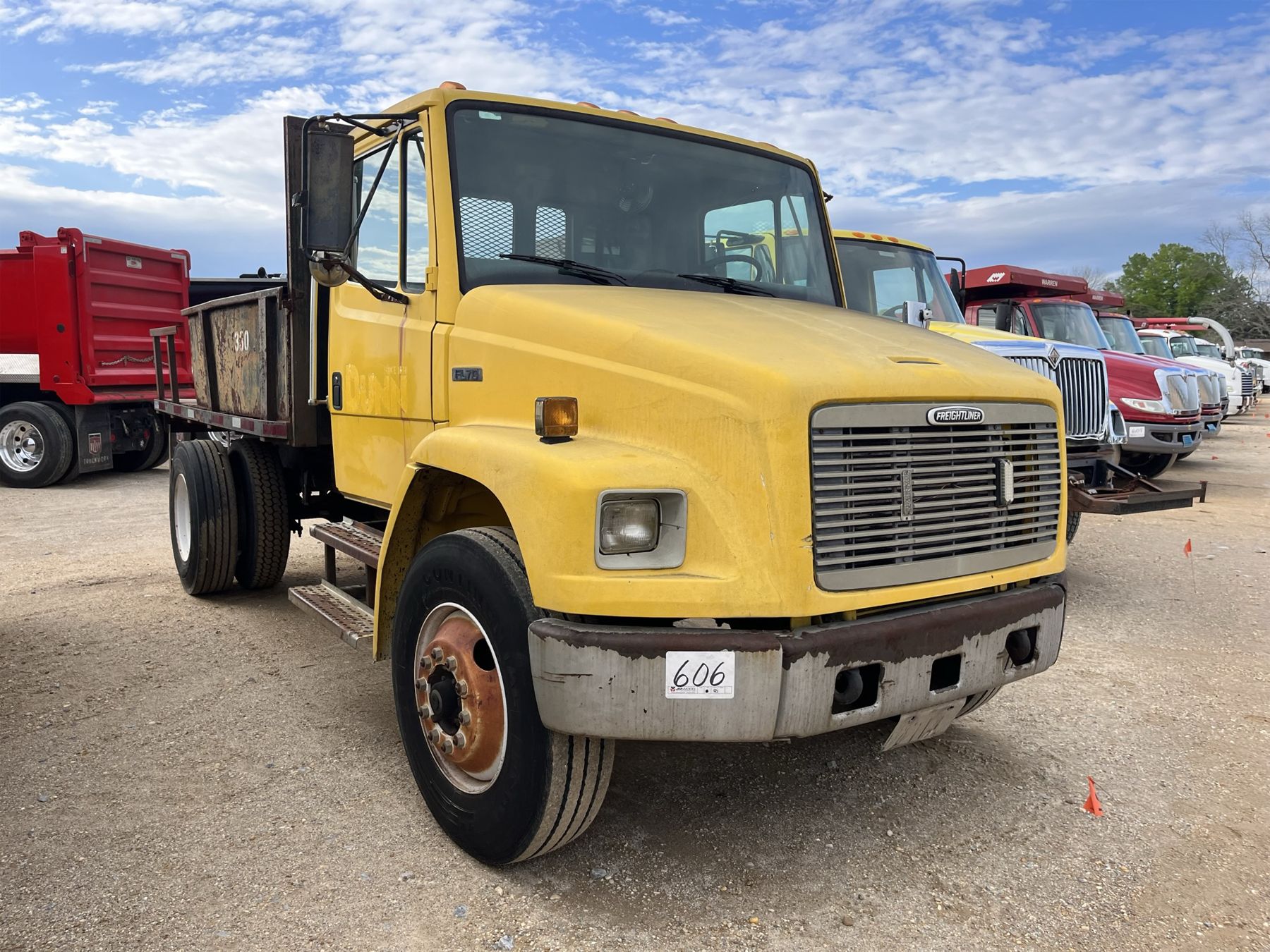 1998 FREIGHTLINER FL70 Flatbed Dump Truck - J.M. Wood Auction Company, Inc.
