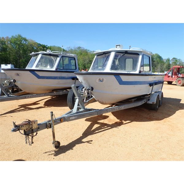CABIN PATROL BOAT, 18'L, IN/OUTBOARD MERCRUISER 6.2L, 9487 HOURS INCLUDES EZ LOAD TANDEM AXLE TRAILE