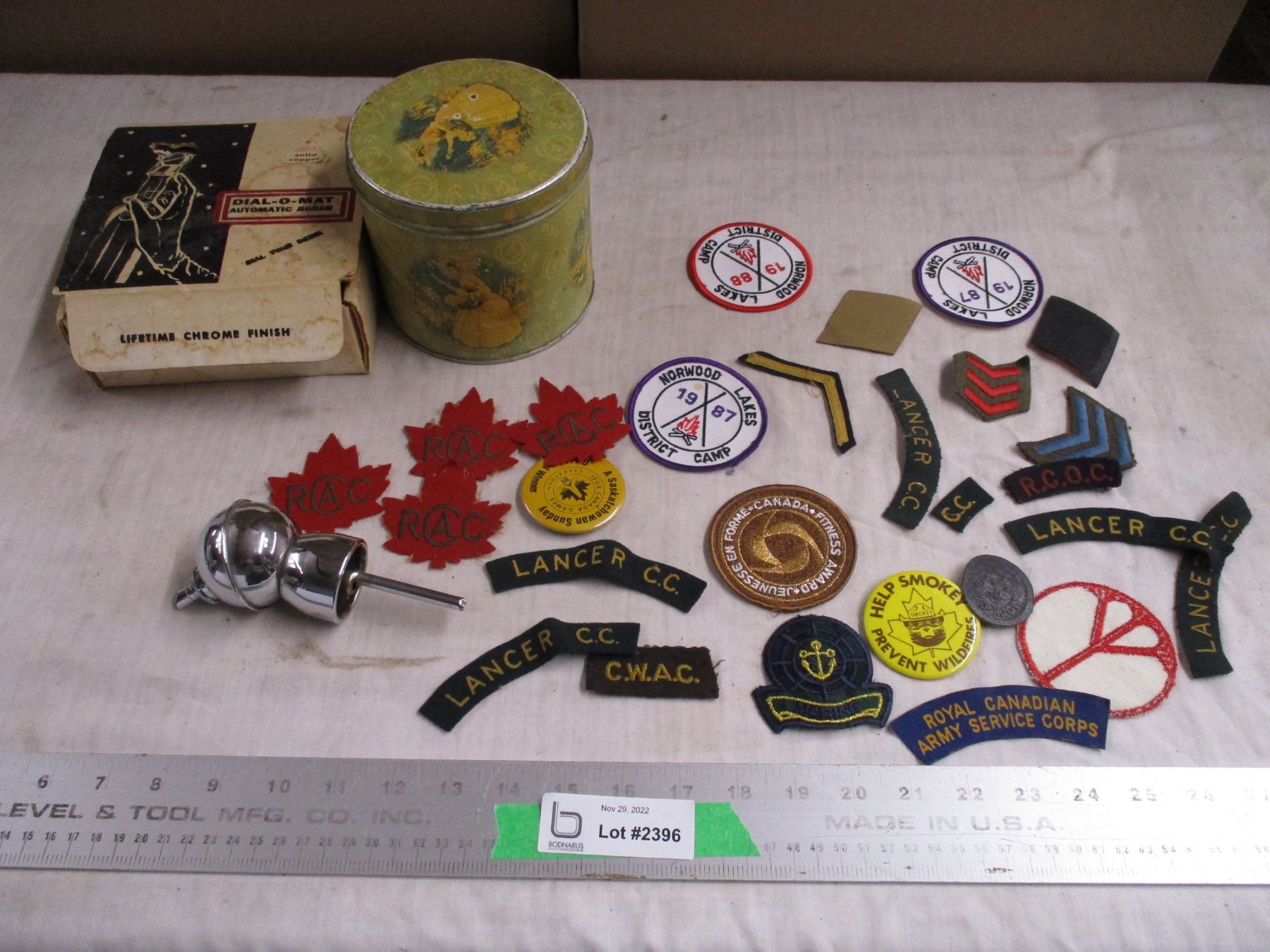 Automatic jigger, patches, button pins, tin Bodnarus Auctioneering