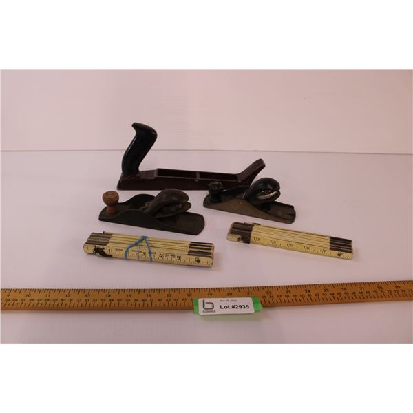 Vintage wood planes and folding measuring sticks