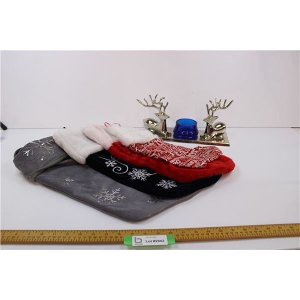 Christmas stockings and reindeer candle holder