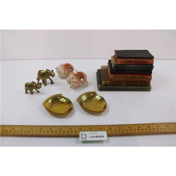 vintage books, bibles in various languages, brass and misc decor