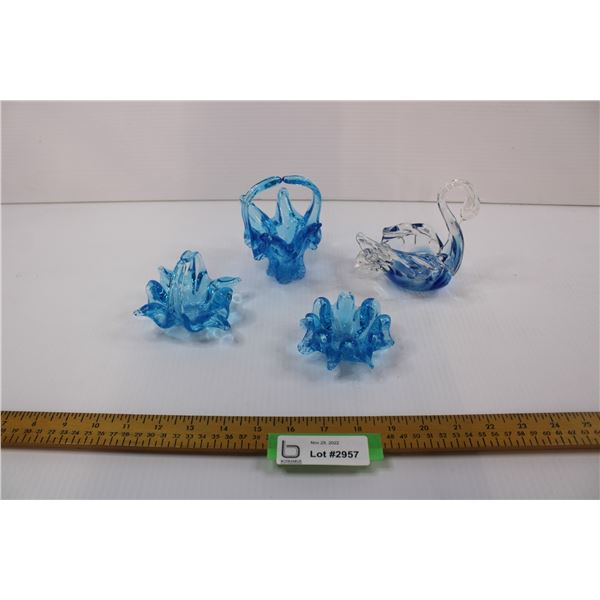 Blue glass dish, swan has damage on wing