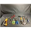 Image 1 : ASSORTED TOOLS: WISS TIN SNIPS, ORANGE HATCHET, SMALL SAW, FOLDING KNIFE, PLIERS, CRAFTSMAN