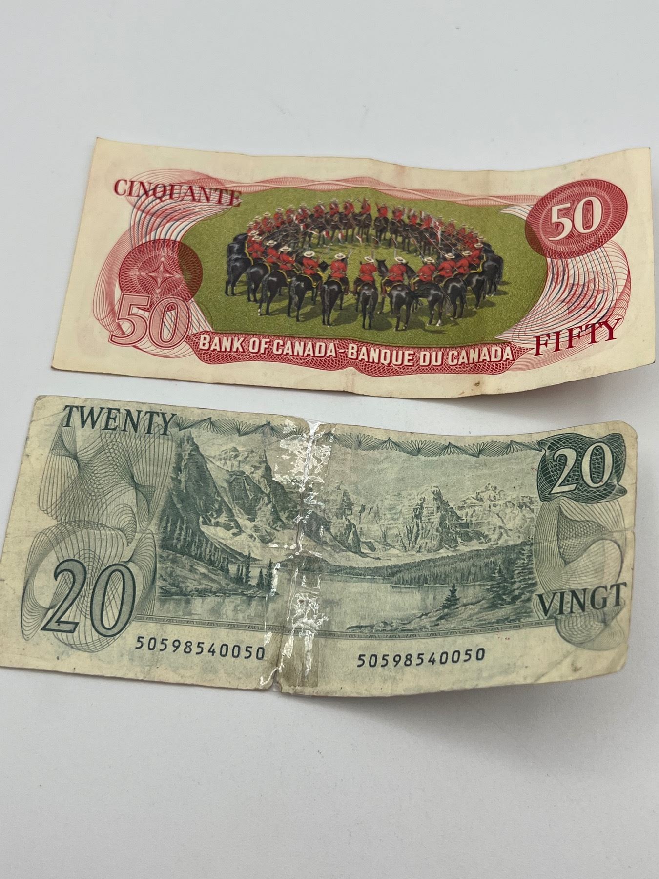 $50 Bill and $20 Bill - Sunrise Estate Services Ltd