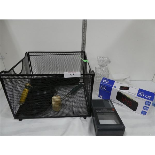 basket, rubber mallet, alarm clock,