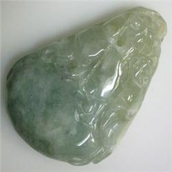 250 CTS CARVED JADE 59x45 MM