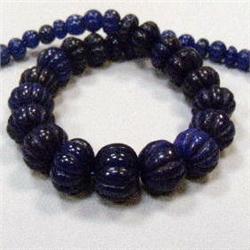 335 CTS CARVED GLASS FILLED ENHANCED SAPPHIRE STRAND 15-13 MM - TEMPORARY CLASP