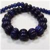 Image 1 : 335 CTS CARVED GLASS FILLED ENHANCED SAPPHIRE STRAND 15-13 MM - TEMPORARY CLASP
