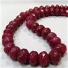 Image 1 : 715 CTS FACETED GLASS FILLED ENHANCED RUBY STRAND 14-12 MM