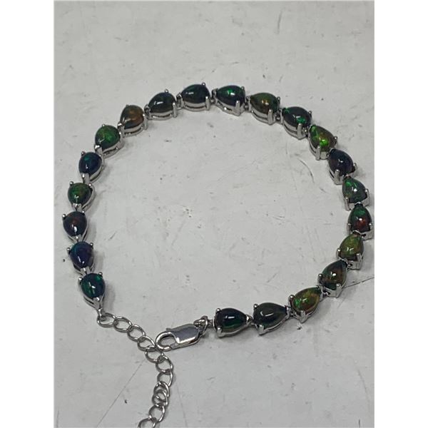Black Opal 17.10 Carat Tennis Bracelet , 925 Silver with certificate Value $2400.00