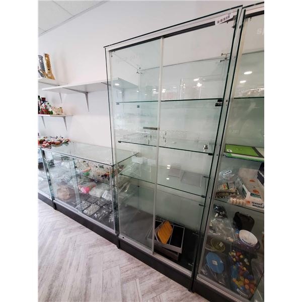 Glass Display Case with shelves, sliding glass front access door, lockable approx 30" x 60"
