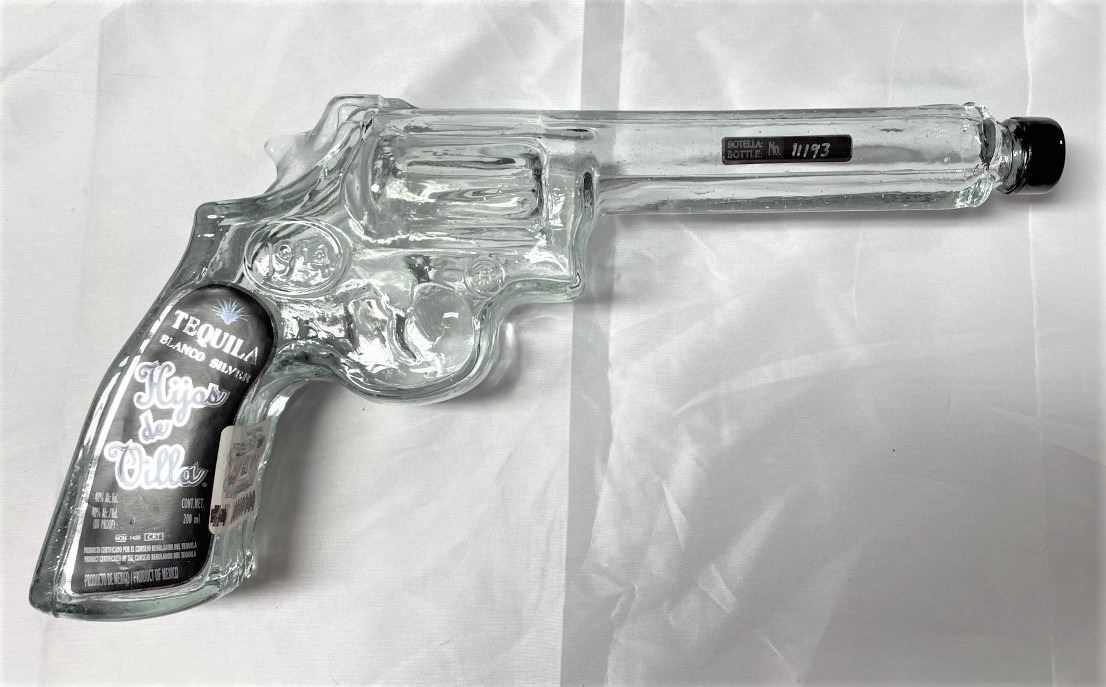 Tequila bottle shaped like pistol