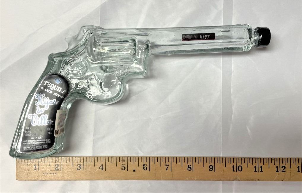 Tequila bottle shaped like pistol