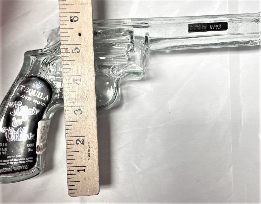 Tequila bottle shaped like pistol