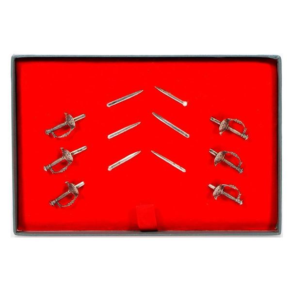 Tiffany & Co. set of sterling silver cocktail picks.