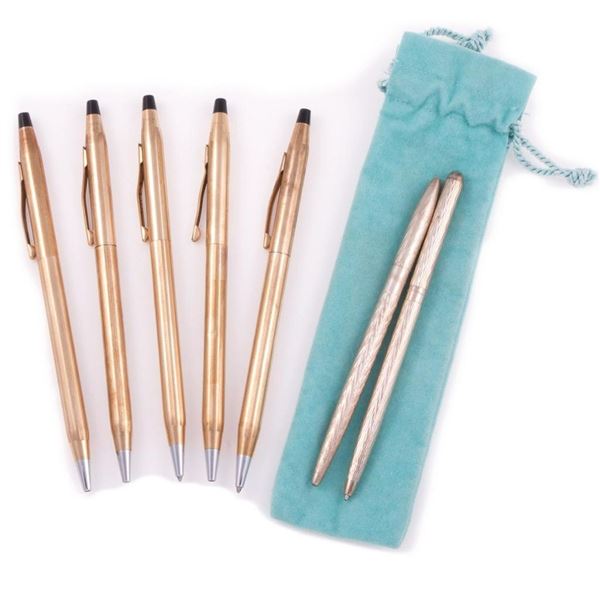 Two Tiffany & Co. silver pens.