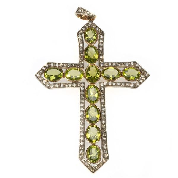 Peridot, diamond, silver-topped 18k gold cross pendant.