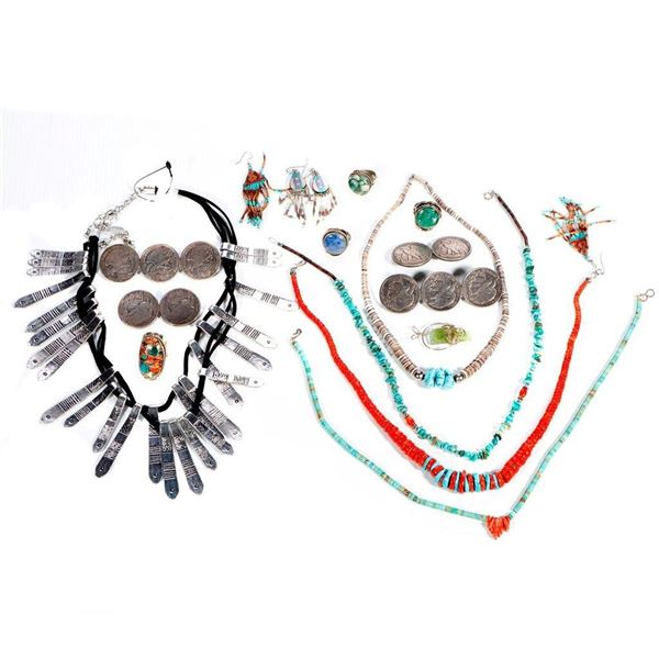 Collection of silver and metal jewelry.
