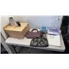 Image 1 : LOT OF PURSES, BELLY BUTTON PIERCINGS, HAIR ROLLERS AND AROMA OIL BURNERS