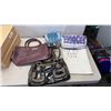 Image 2 : LOT OF PURSES, BELLY BUTTON PIERCINGS, HAIR ROLLERS AND AROMA OIL BURNERS
