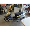 Image 1 : 48V ELECTRIC SCOOTER HAS POWER AND CHARGER, SHELL HAS DAMAGE INCLUDES KEY AND 2 SIDE MIRRORS
