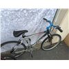 Image 3 : BLACK TREK BIKE. AND RED BMX BIKE
