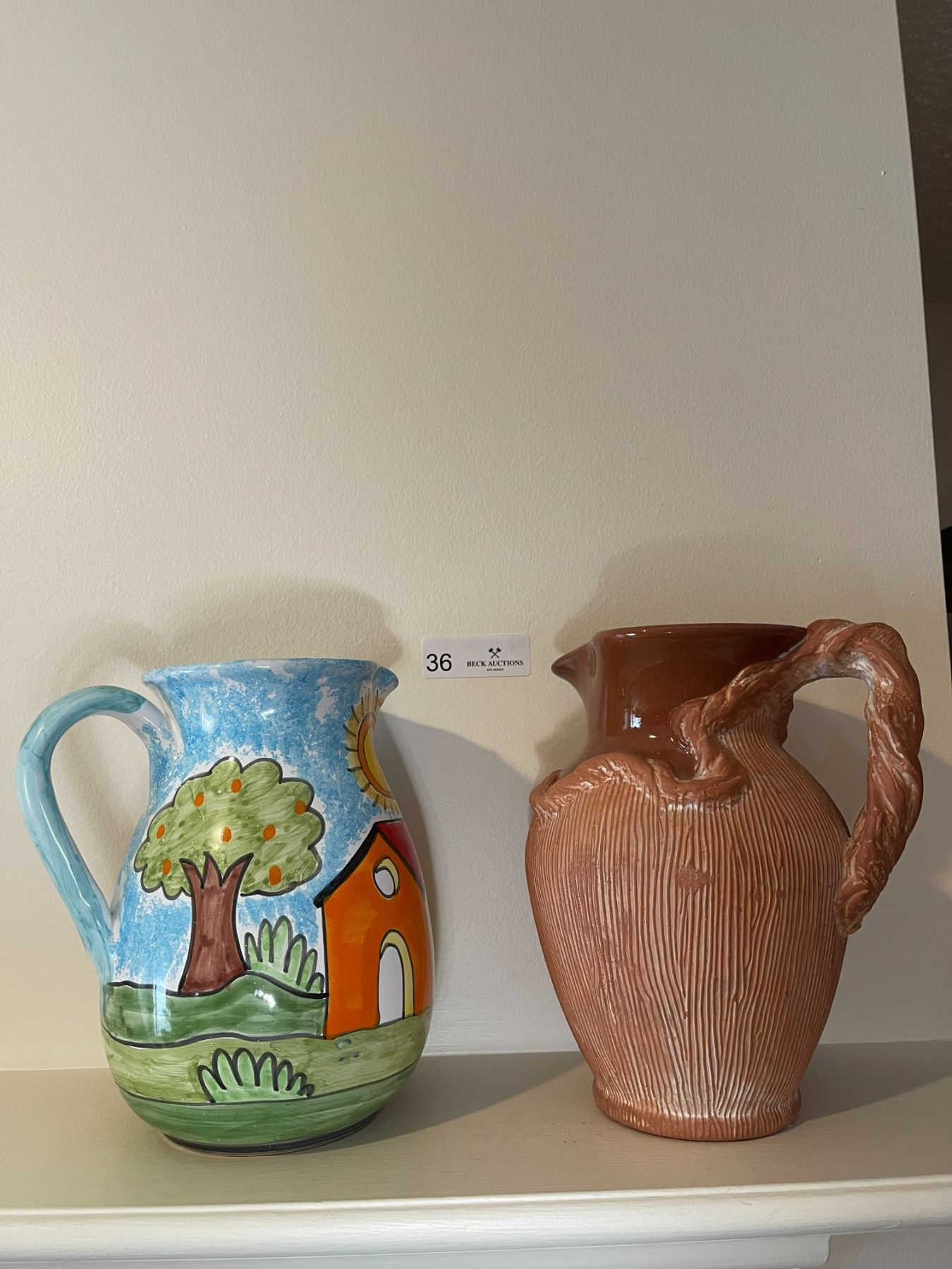 Pottery Jugs 9" Beck Auctions Inc.