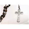 Image 2 : 29)  VINTAGE  HEAVILY ETCHED CROSS  ON BROWN