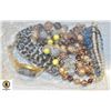 Image 1 : BAG OF VINTAGE BEADED NECKLACES AND WATCHES